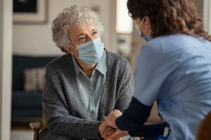 Elderly woman getting treatment for addiction, with Medicare.