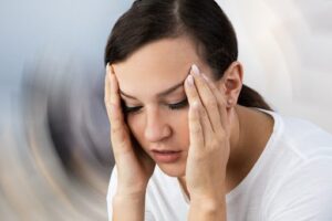 Young woman experiencing the side effects of psychedelics. 