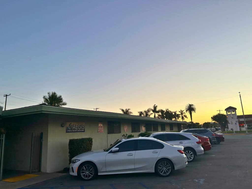 Cars parked in front of of Aegis Oxnard
