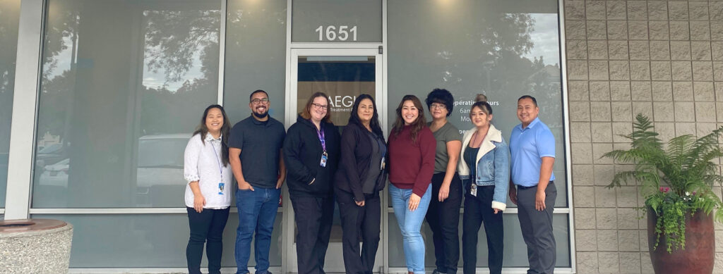 Employees standing in front of Aegis Turlock