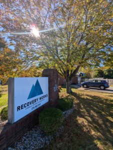 Building sign showing Recovery Works Elizabethtown