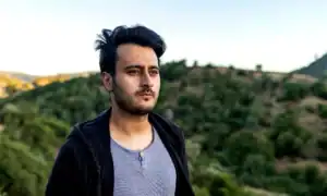 man looking to the hills