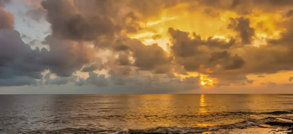 dramatic sky with clouds over the ocean